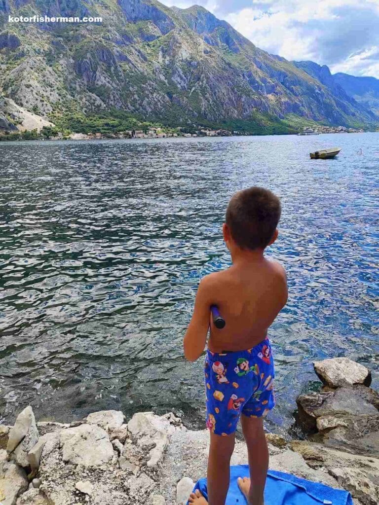 Family Fishing at Sea at summer